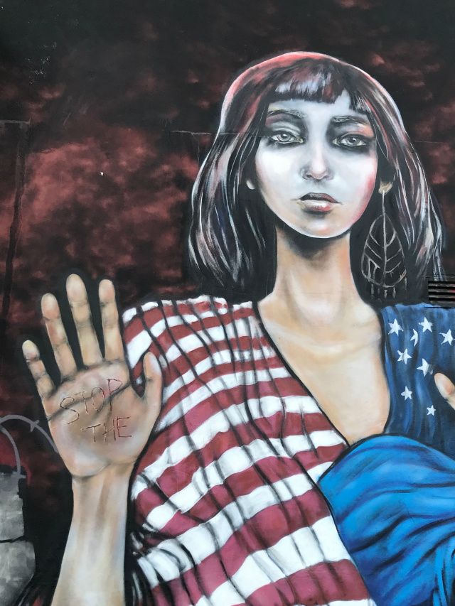 I like the message written on her hands, so true. Lynwood, Miami.